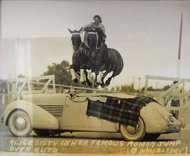 Alice Sisty and her team, jumping a car - circa 1940..jpg